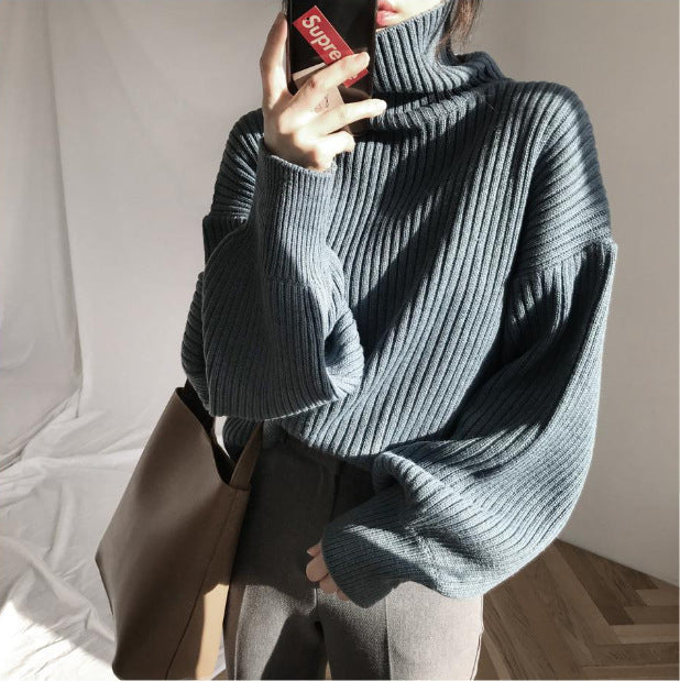 Jersey Olivia – Cuello alto y manga abullonada