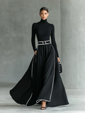 Vestido Gina – Maxi negro con costuras blancas