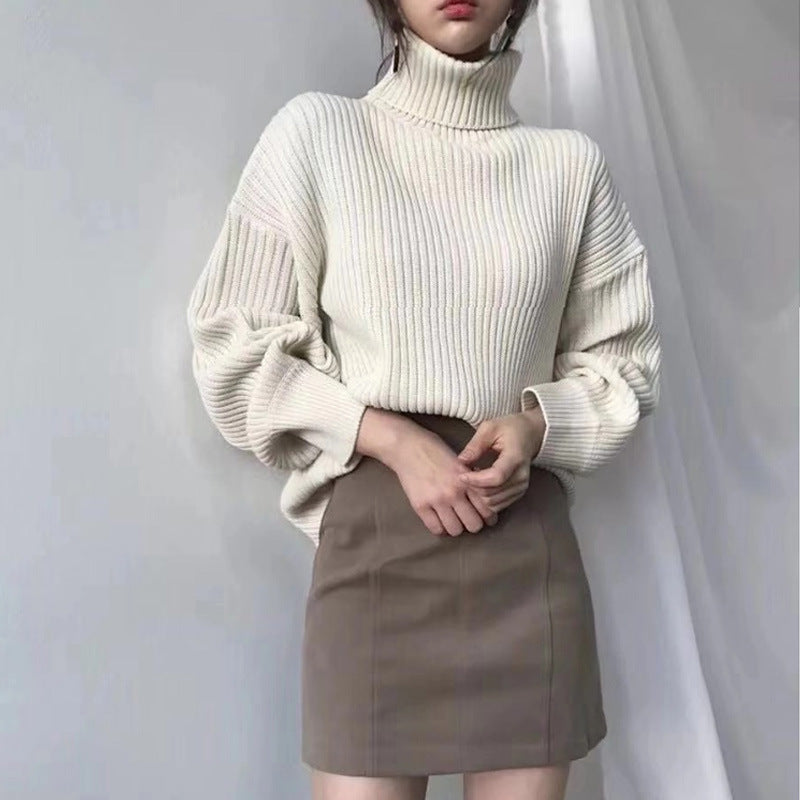 Jersey Olivia – Cuello alto y manga abullonada