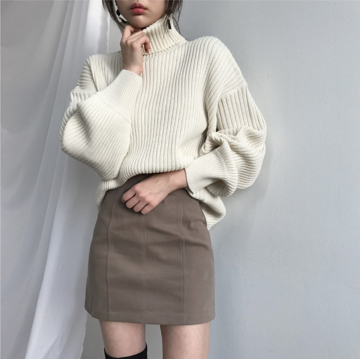 Jersey Olivia – Cuello alto y manga abullonada
