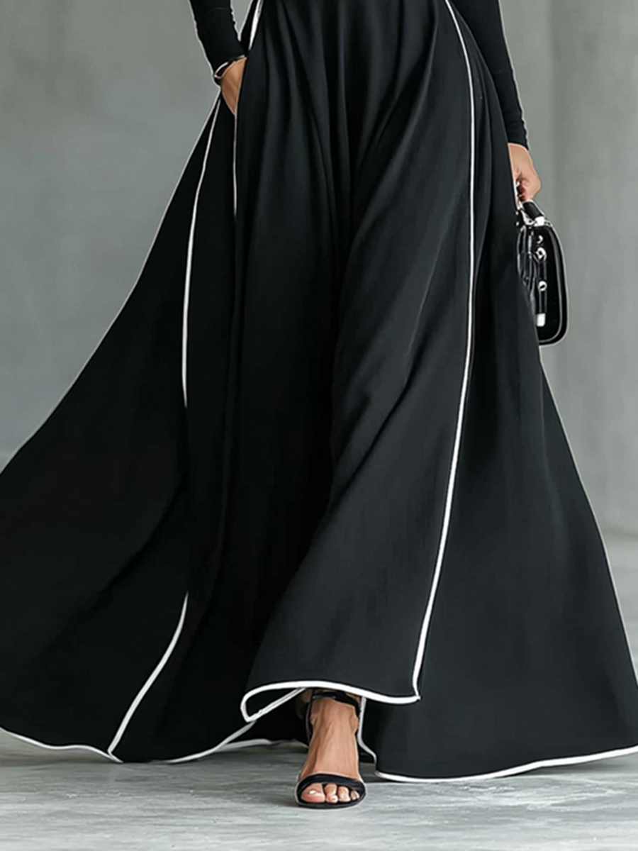 Vestido Gina – Maxi negro con costuras blancas