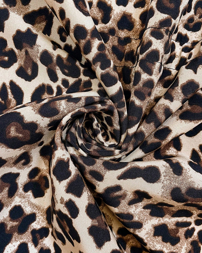 Abrigo Reversible – Leopardo con capucha