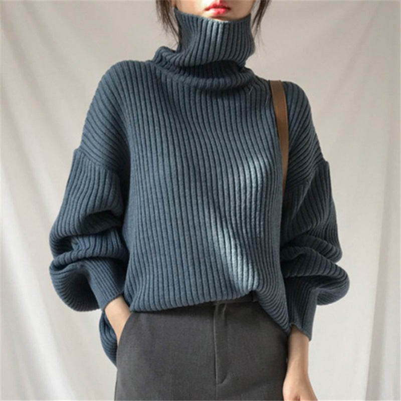 Jersey Olivia – Cuello alto y manga abullonada
