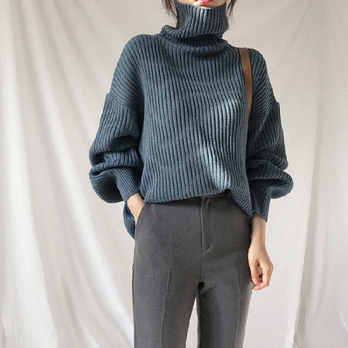Jersey Olivia – Cuello alto y manga abullonada